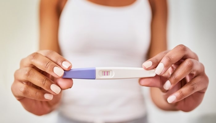 pregnancy-kit-showing-two-pink-lines