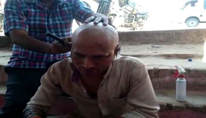 Angry BJP functionary shaved his head after being denied ticket