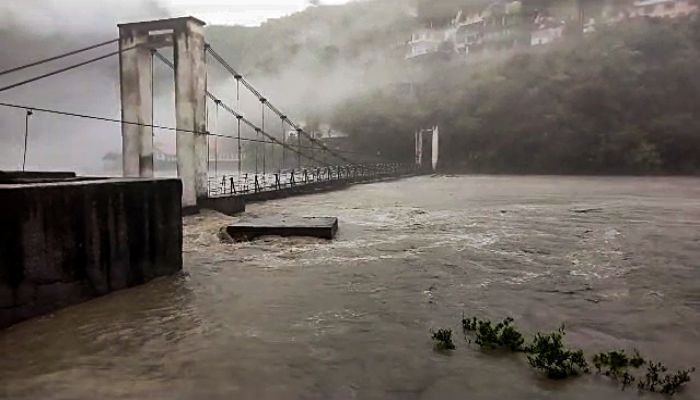 A-bridge-near-Chaba-Power-House-gets-flooded-amid-heavy-rainfall-in-Shimla