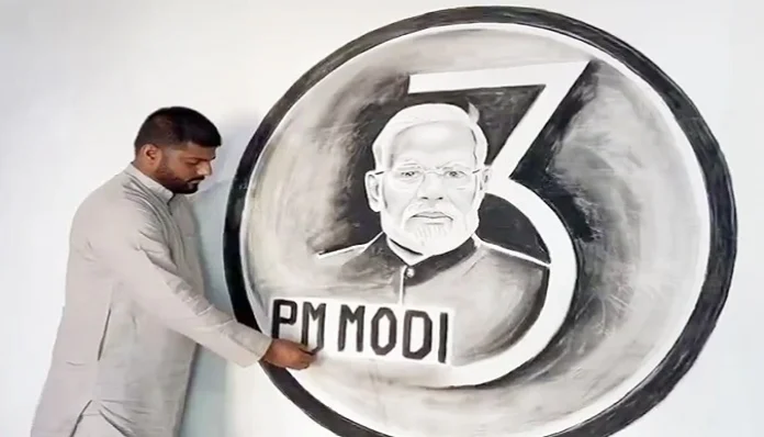 amroha-artist-painted-a-living-portrait-of-pm-modi-with-coal